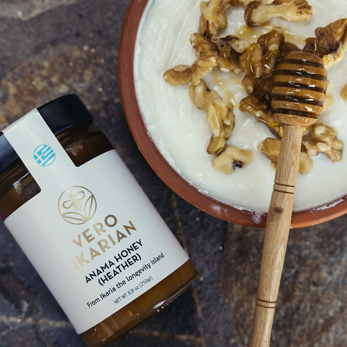 Raw Ikaria honey with a dipper