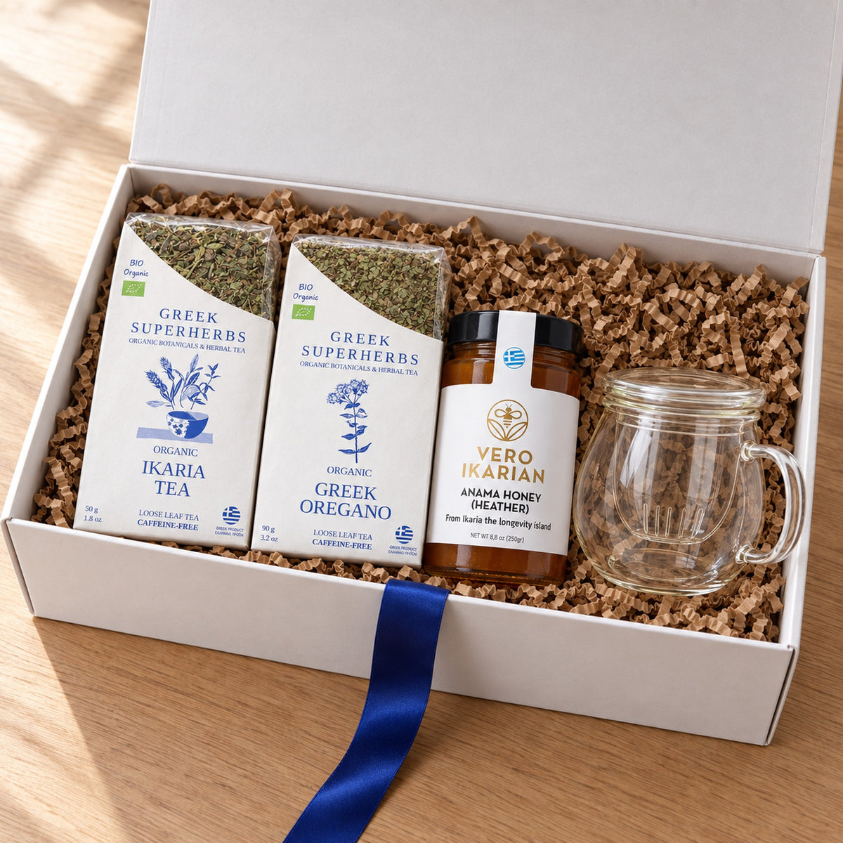 Ikaria Longevity Ritual Gift Set with glass tea cup — Ikaria tea, Greek oregano, heather honey, white gift box with kraft crinkle paper
