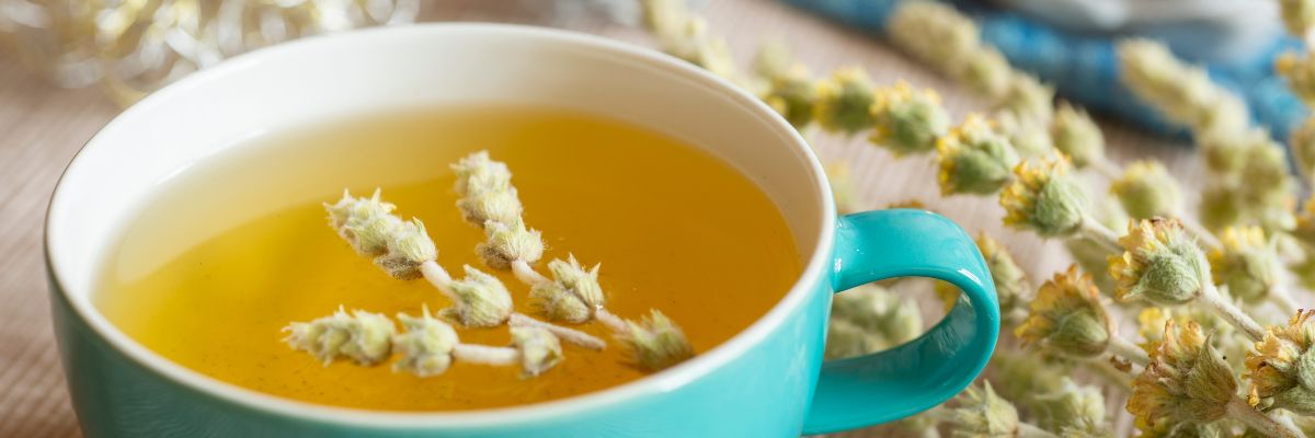 Greek herbs and a cup