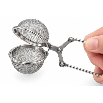 Squeeze the handle and the fine stainless mesh ball opens for filling